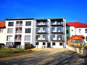 Novostavba domu s osmi byty a parkováním, cena cena v RK, nabízí 